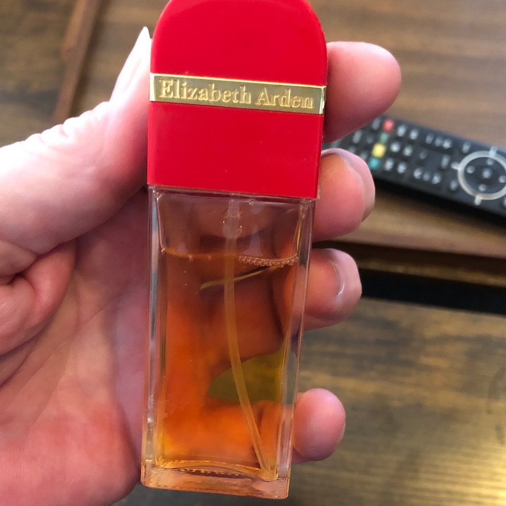 Elizabeth Arden Red and Gold Perfume BottleRec Door